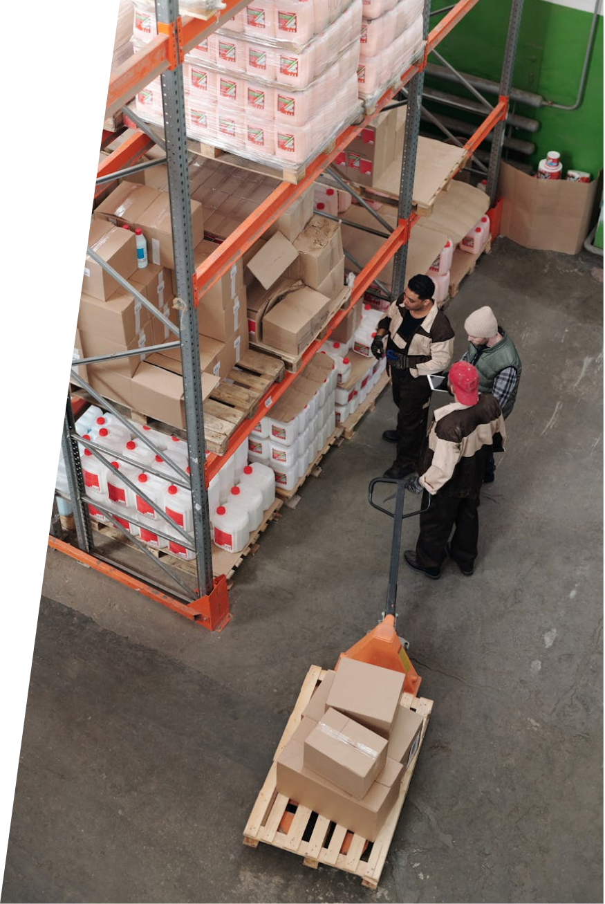 Warehouse worker scanning a returned item with a mobile device